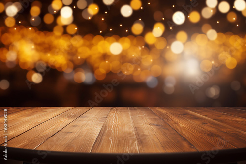 Wooden table in front of blurred background with bokeh lights. 
