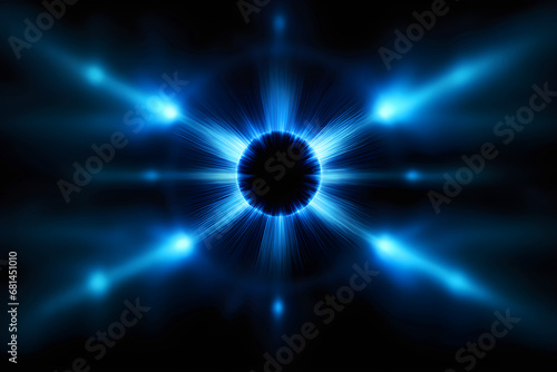 Abstract blue lens flare effect on black background