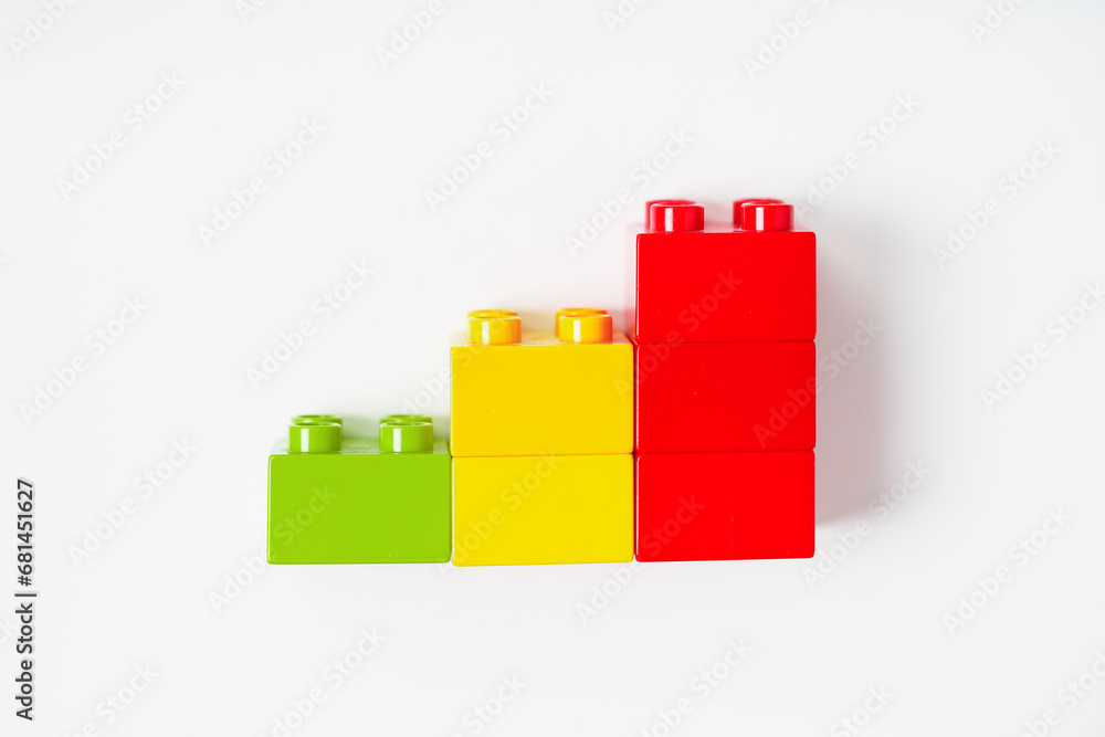 Colorful Brick Chart on white Background. Data Visualization with Toy Blocks for kids. Bank, finance, investment, creative solution, money concept. Infographic Colorful Brick Chart on white Background. Data Visualization with Toy Blocks for kids. Bank, finance, investment, creative solution, money concept. Infographic