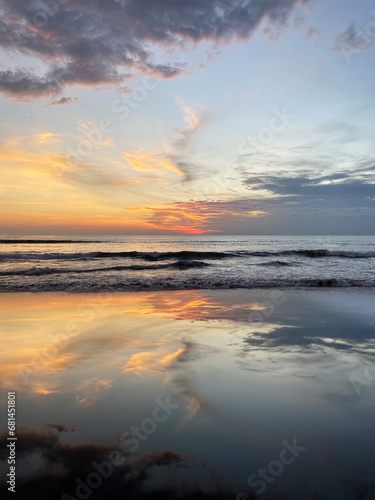 beautiful sunset on Bali. the sky is reflected in the ocean