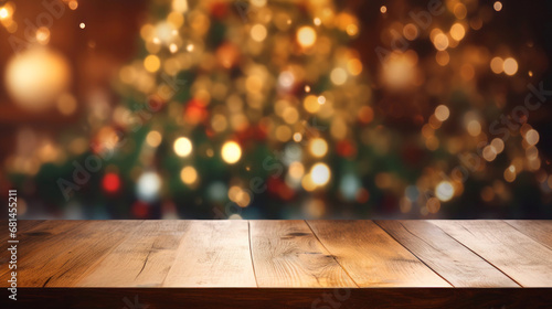 Wooden tabletop and blurred Christmas tree background with beautiful bokeh for displaying or mounting your products, Copy space