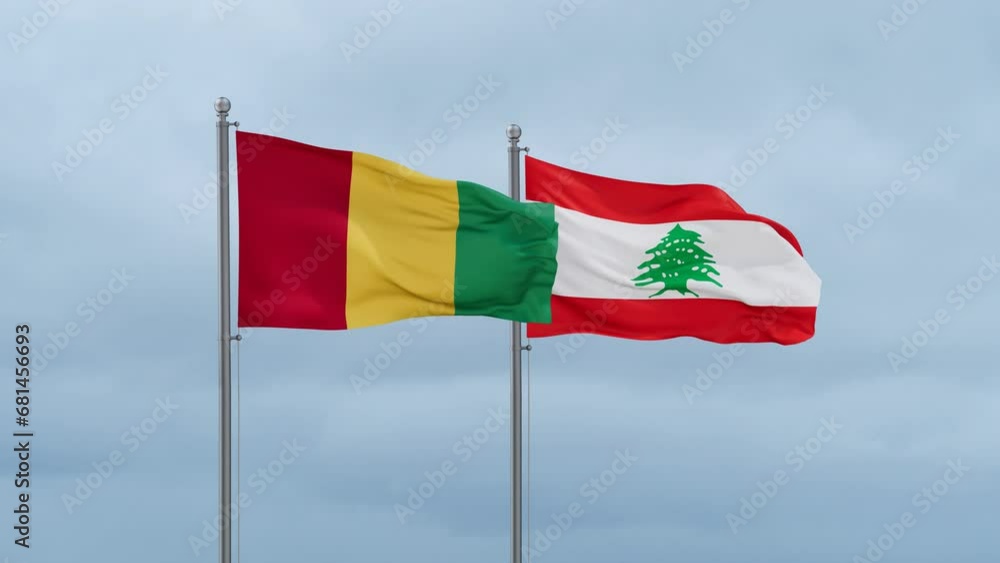 Lebanon flag and Republic of Guinea flag waving together on cloudy sky, endless seamless loop, two country relations concept Lebanon flag and Republic of Guinea flag waving together on cloudy sky, endless seamless loop, two country relations concept