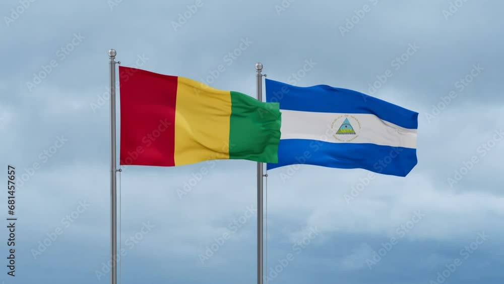 Nicaragua flag and Republic of Guinea flag waving together on cloudy sky, endless seamless loop, two country relations concept Nicaragua flag and Republic of Guinea flag waving together on cloudy sky, endless seamless loop, two country relations concept