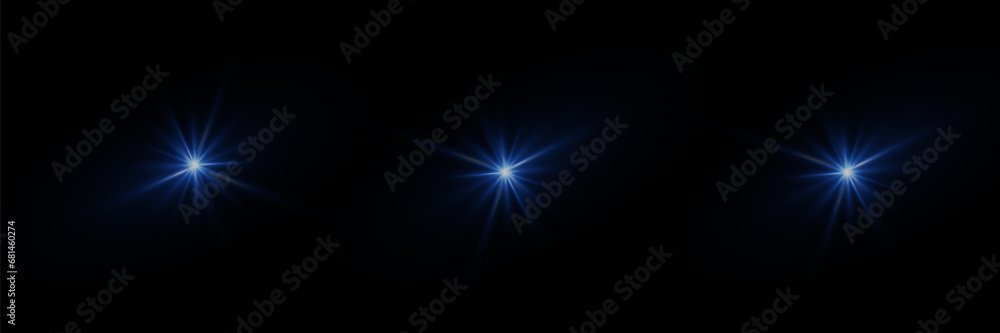 A flash of light and the sparkle of stars. Light of lights and glare. On a dark background.