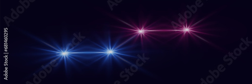 A lens flare representing a camera flash with a special light effect. On a dark background.