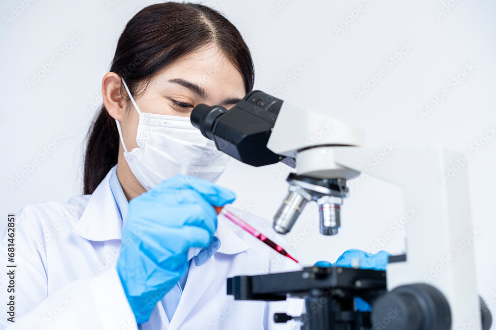 Drug research in chemistry lab, The blood droplet for microscopic examination Drug research in chemistry lab, The blood droplet for microscopic examination