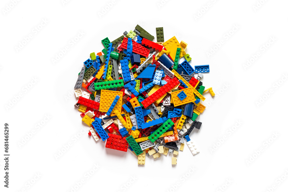 Naklejka premium White Background with Assorted Toy Blocks: Creative Building Material. Lego blocks. Novosibirsk, Russia - October 26, 2023.