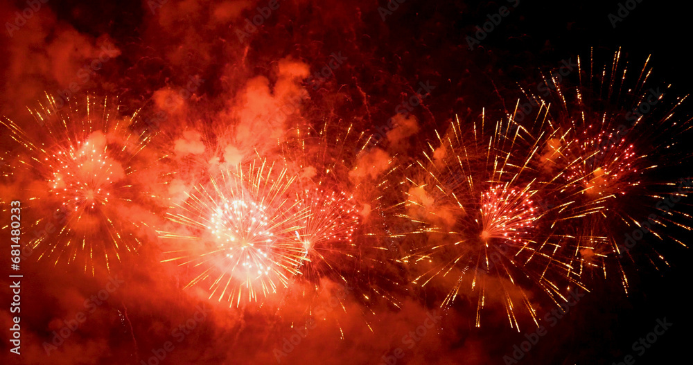 Fototapeta premium Red Firework celebrate anniversary in night time celebrate national holiday. Happy new year 2024, 4th of july holiday festival. Red firework Countdown to new year 2024 festival party time event