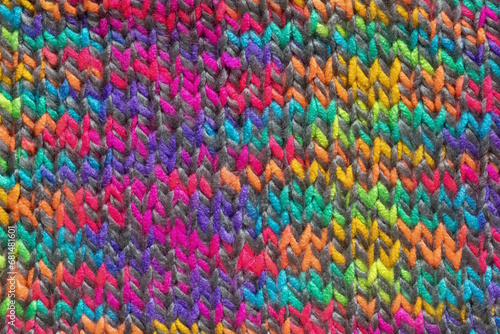 Close up front side knitting. Colorful yarn. Hobby handmade concept