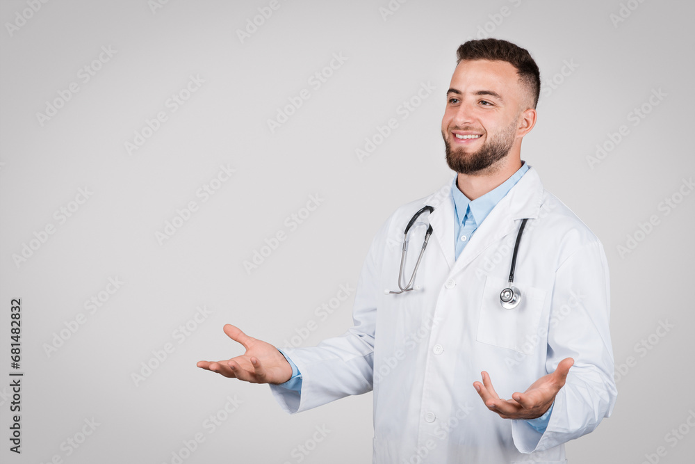 Male doctor gesturing with open hands Male doctor gesturing with open hands