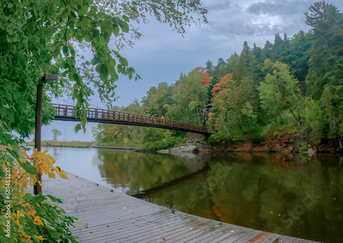 Cable Bridge Crossing the River photo