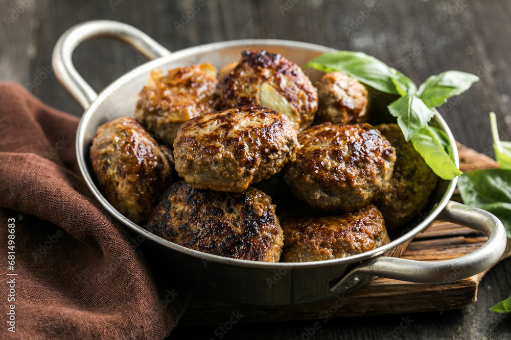 Homemade  croquettes  or patties. Fritters from minced pork. Delicious and nutritious lunch or dinner. - obrazy, fototapety, plakaty 