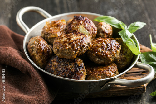 Homemade  croquettes  or patties. Fritters from minced pork. Delicious and nutritious lunch or dinner. photo