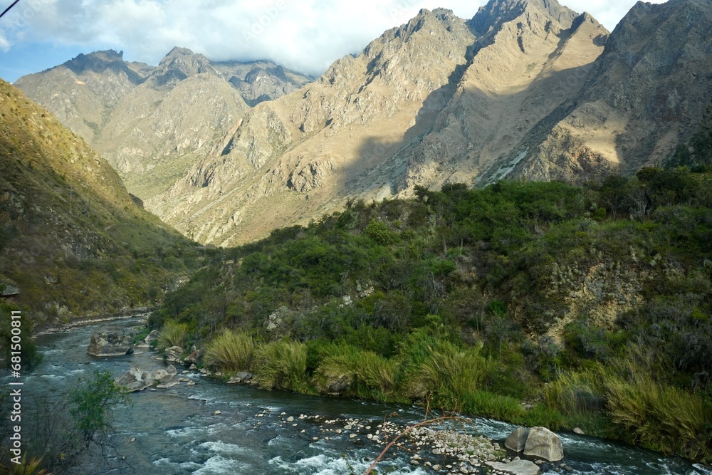 The Urubamba River in Peru in The Sacred Valley with The Andes Mountain range behind. 