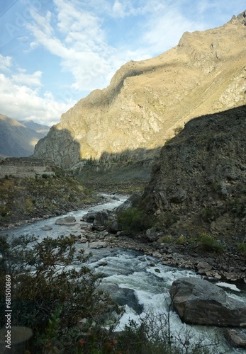 The Urubamba River in Peru in The Sacred Valley with The Andes Mountain range behind. 