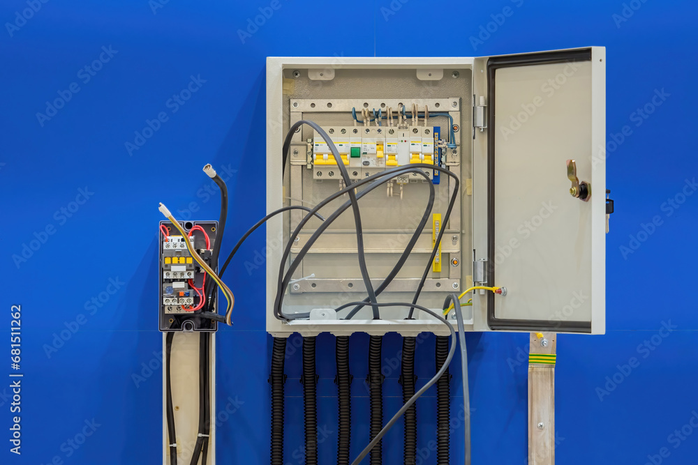 Electrical panel with protruding wires. Unfinished power