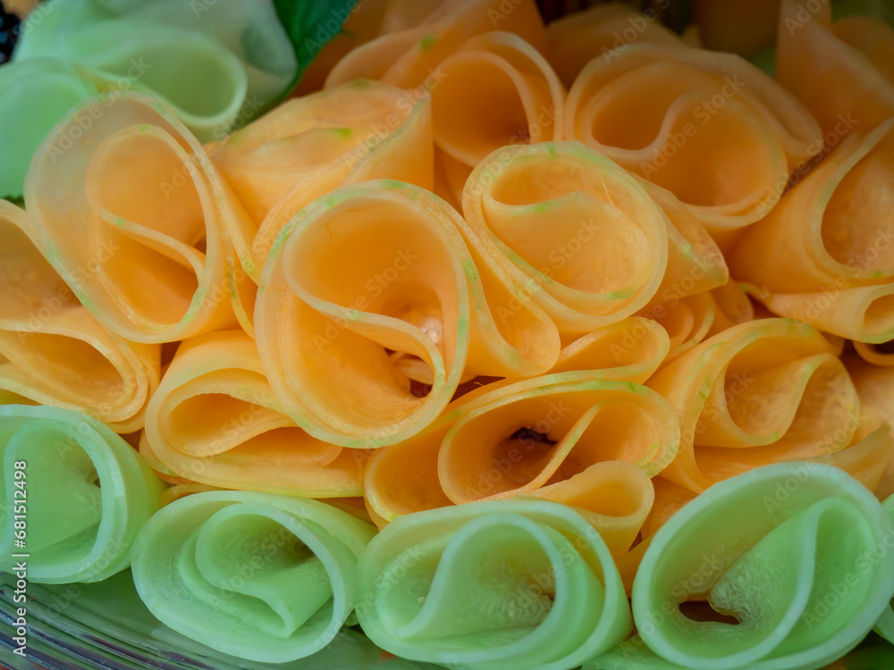 Nicely sliced and rolled melon strips used as decoration