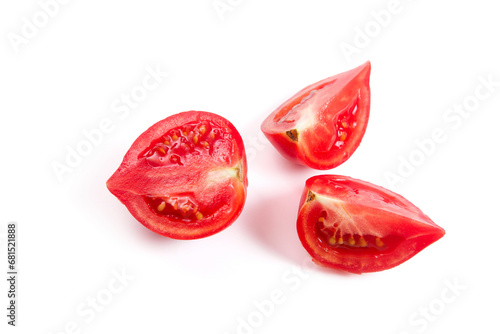 Cut pink tomato isolated on white background.