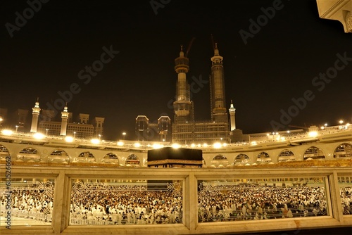 City of Mecca in the Kingdom of Saudi Arabia. October 23, 2023: Muslims circumambulate the Holy Kaaba. Muslims perform their worship, Umrah, Hajj
 photo