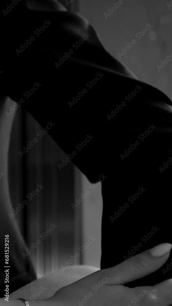 hands of a charming bride close-up touching the hands of the groom, romance and tenderness during the wedding celebration hands of a charming bride close-up touching the hands of the groom, romance and tenderness during the wedding celebration