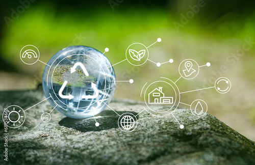 Glass globe in green forest with the icon environment of ESG, co2,  and net zero.Technology Environment, society, and governance for sustainable, environment Concept.