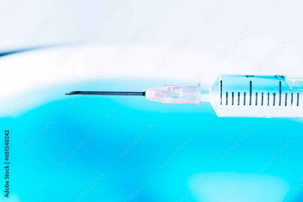 Close up of a syringe. Focus on numbers,macro syringe Close up of a syringe. Focus on numbers,macro syringe