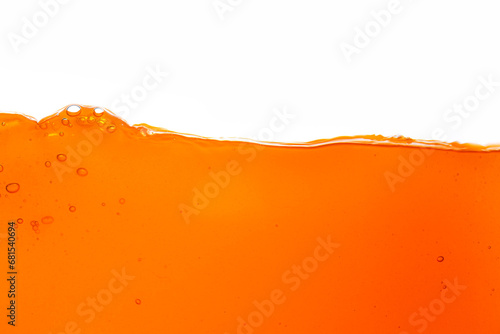 Orange juice isolated white background,orange juice texture on white background,Close up bright orange juice texture for health and nature waves 