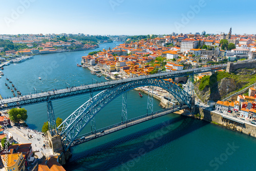 Famous bridge Ponte dom Luis above old town of Porto at river Duoro, Portugal photo