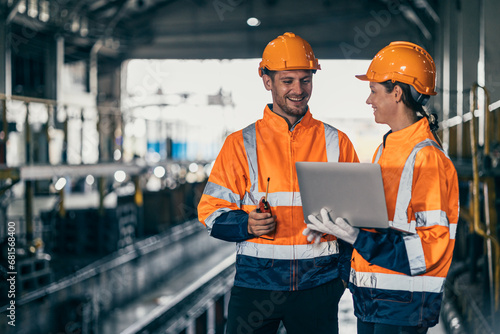 Engineer team man flirt women while working happy together enjoy friend relax smiling talking in industry factory.