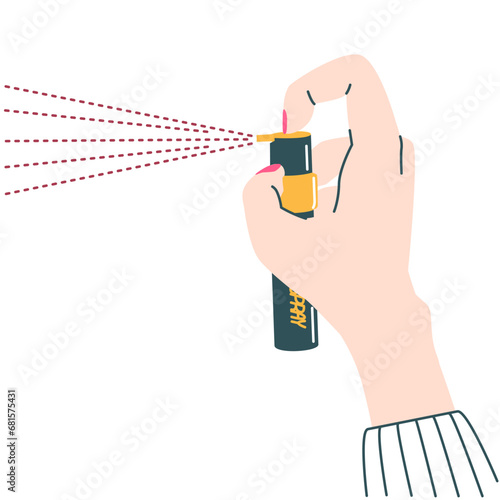 Woman's hand holding and using pepper spray