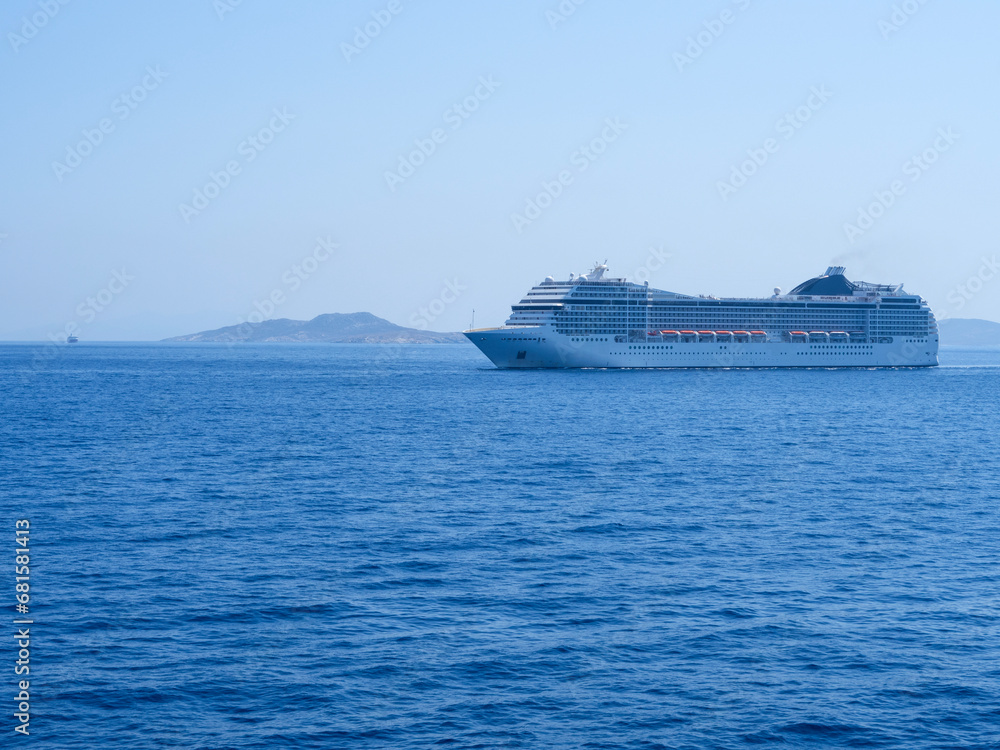 Large cruise liner in the sea port of Mykonos Island in Greece