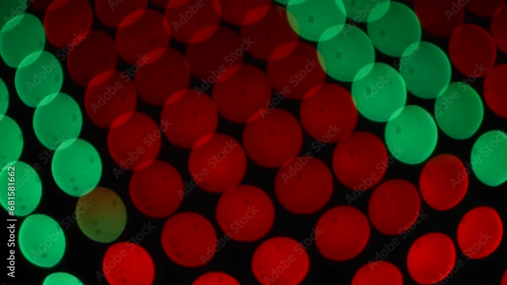 Pista de baile con efecto bokeh en color rojo y verde circular ideal para fondos 