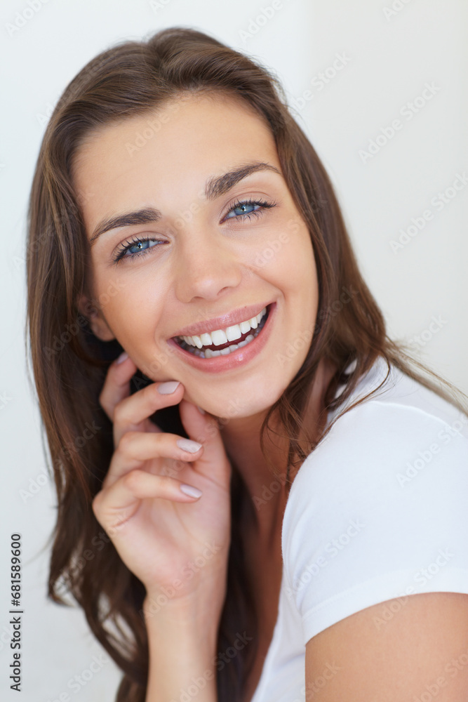 Portrait, smile and skincare with a young woman in studio on a white background for natural dermatology. Face, aesthetic or beauty and a happy person looking confident with her antiaging skin routine Portrait, smile and skincare with a young woman in studio on a white background for natural dermatology. Face, aesthetic or beauty and a happy person looking confident with her antiaging skin routine