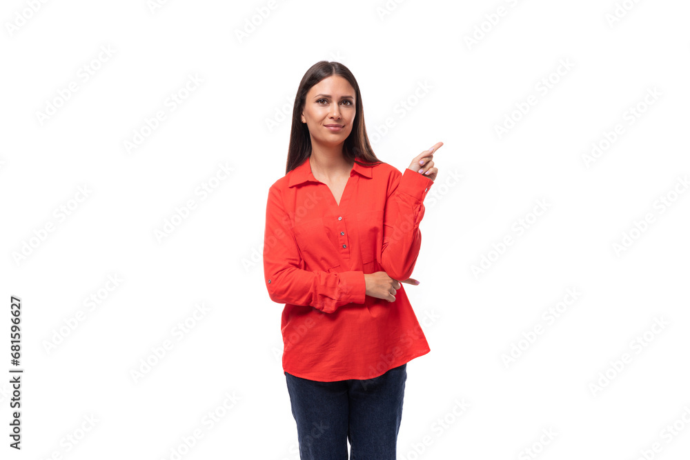 young successful brunette assistant woman dressed in a red blouse on a white background with copy space young successful brunette assistant woman dressed in a red blouse on a white background with copy space