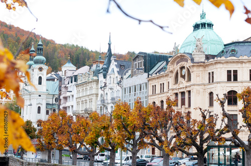 city in the middle of an autumn forest, a famous spa town of Karlovy Vary in the Czech Republic photo