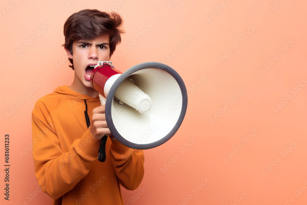 Young boy shouting into a megaphone on solid background copy space. ai generative - obrazy, fototapety, plakaty 