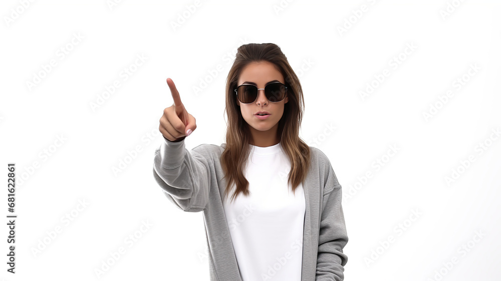 Girl with sunglasses pointing upwards, isolated on a stark white background Girl with sunglasses pointing upwards, isolated on a stark white background