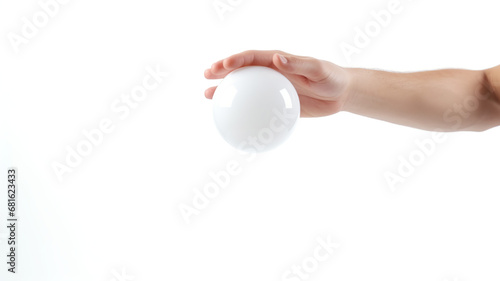 Hand holding a ball in balance  isolated on a white background 