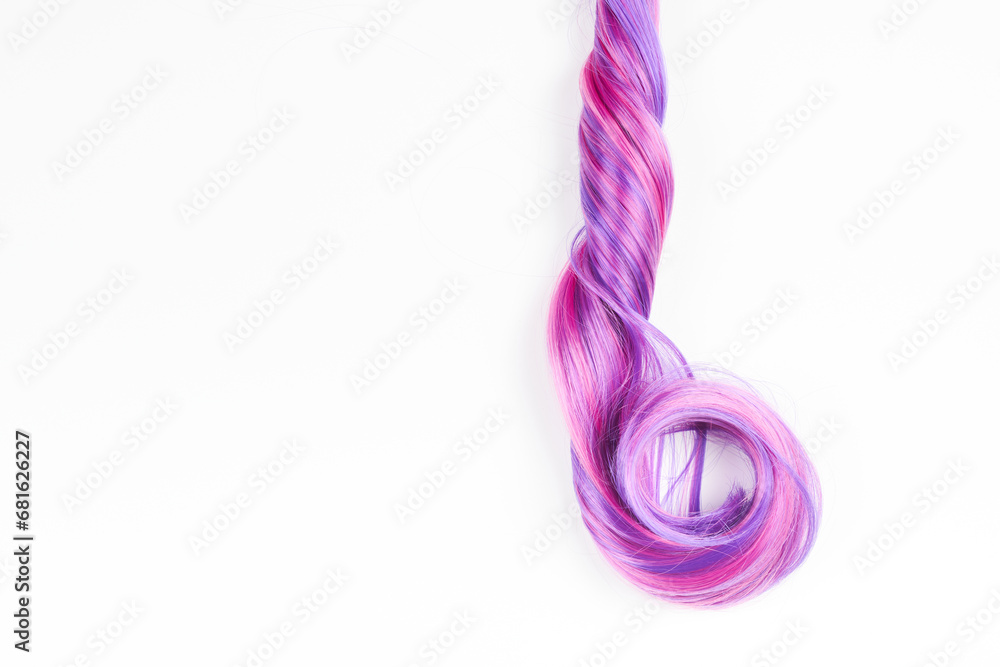 Natural looking shiny hair pink bright color, cosplay wig on a white background Natural looking shiny hair pink bright color, cosplay wig on a white background