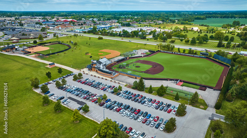 Fototapeta Naklejka Na Ścianę i Meble -  Pristine First Merchants Ballpark Muncie, IN aerial with parking lot and Varsity Softball Complex