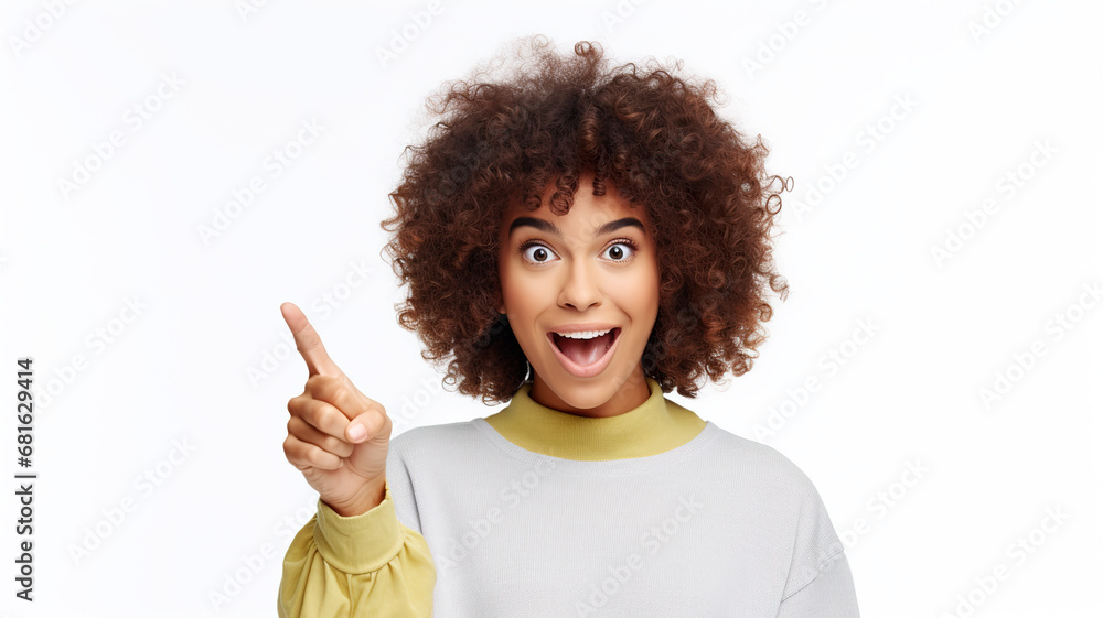 Isolated on a background of pure white, a surprised and joyful girl points left. Isolated on a background of pure white, a surprised and joyful girl points left.