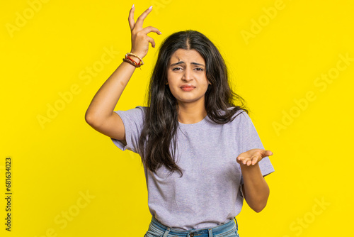 Obraz na plátně Sad young Indian woman feeling hopelessness loneliness nervous breakdown loses surprised by lottery results bad fortune loss unlucky news game fail