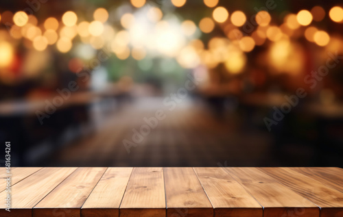Wooden empty table in front of blurred cafe and park background