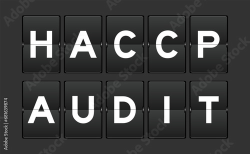 Black color analog flip board with word HACCP (Hazard Analysis Critical Control Points) audit on gray background