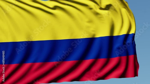Close-up of the national flag of Colombia flutters in the wind on a sunny day , 4k slow motion photo