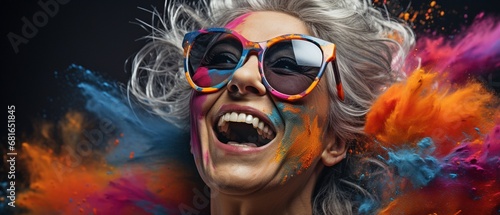 A young, gray-haired woman is dancing and celebrating. Gel-colored portraits .