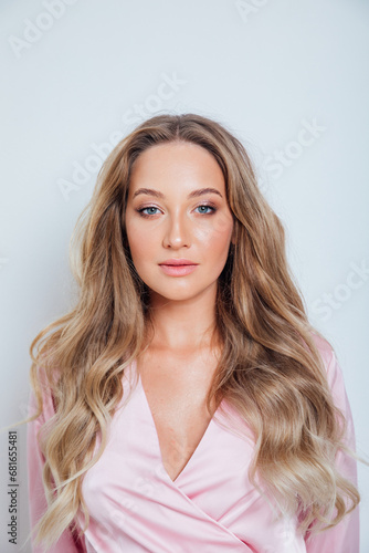 Portrait of a beautiful blonde woman with blue eyes
