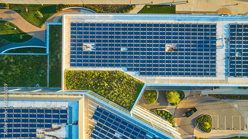 Solar panels on Ball State University building aerial over clean energy rooftops, Muncie, IN photo