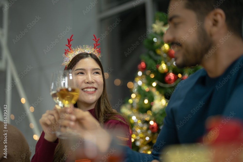 close up girl hold glasses of champagne with lighting. Dinner party with drinking of champagne. hands holding clear glass with alcohol in yellow shine reflect. close up girl hold glasses of champagne with lighting. Dinner party with drinking of champagne. hands holding clear glass with alcohol in yellow shine reflect.