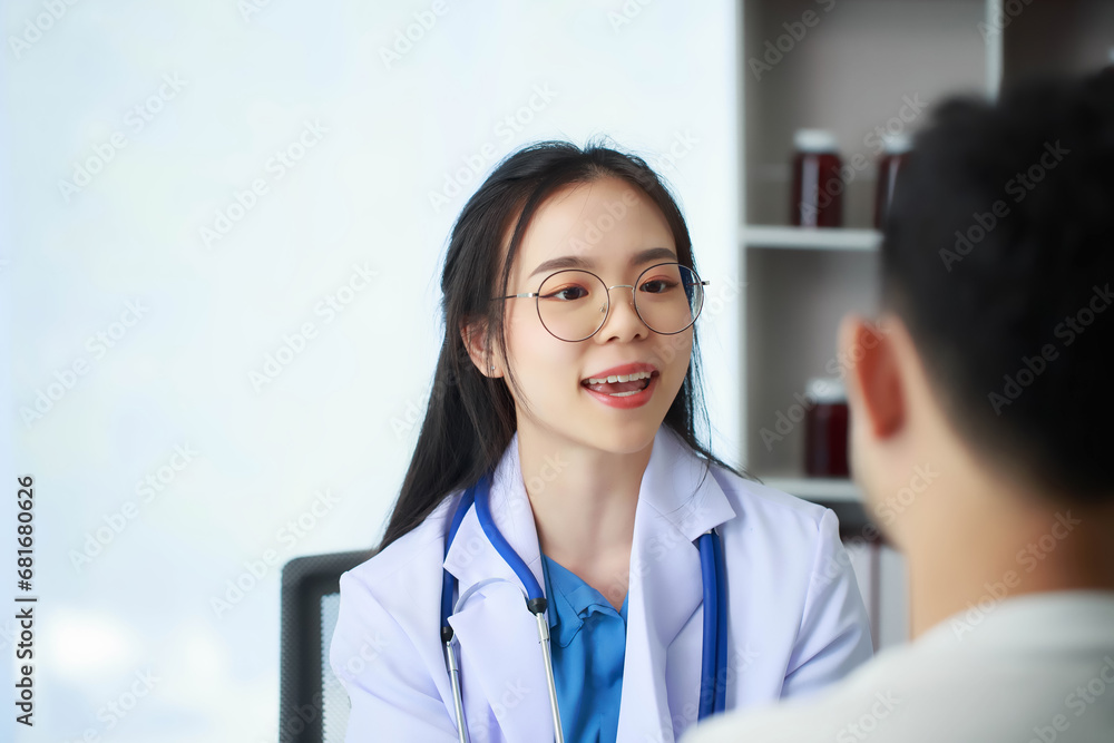 Doctor talking with patient in hospital, The doctor is explaining information about various diseases and treatment methods in detail for the patient to understand before treatment. Doctor talking with patient in hospital, The doctor is explaining information about various diseases and treatment methods in detail for the patient to understand before treatment.